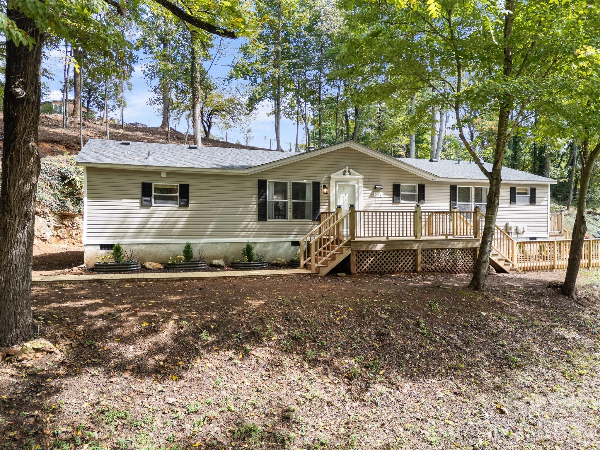 25 Overbrook Drive Saluda, NC 28773 - Photo 42 of 42 a view of a house with a yard and large tree