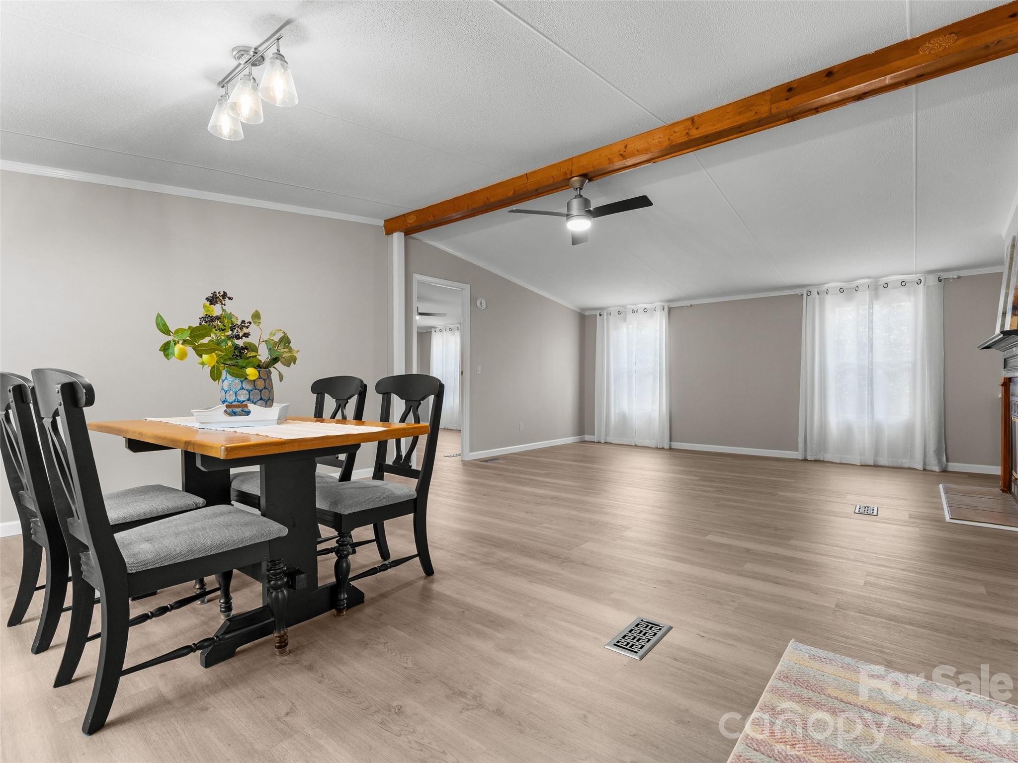 25 Overbrook Drive Saluda, NC 28773 - Photo 9 of 42 a view of a dining room with furniture and wooden floor