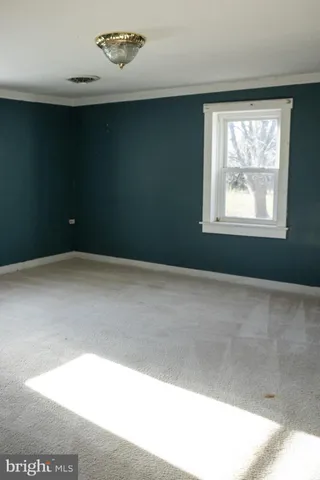 a view of empty room with window