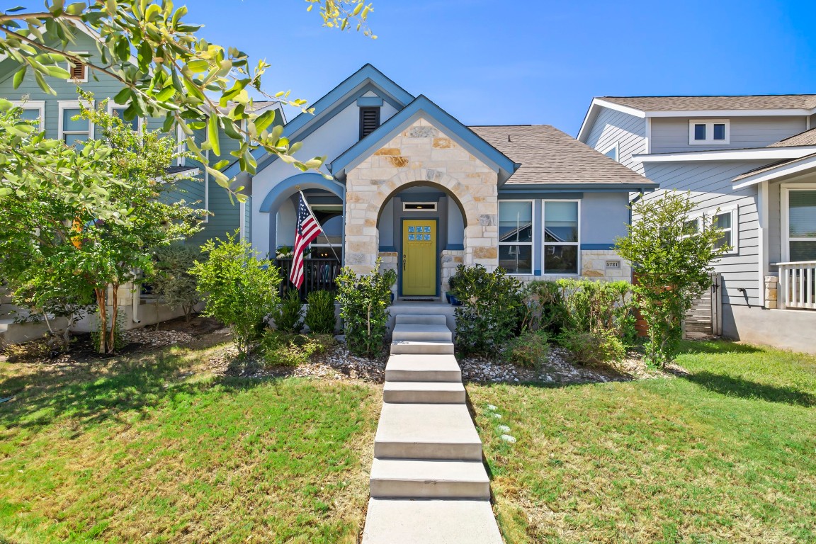 5721 Baythorne Drive Austin, TX 78747 - Photo 1 of 1 a front view of a house with a yard