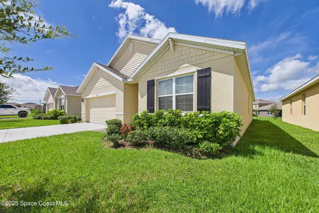 a kitchen with granite countertop stainless steel appliances and sink
