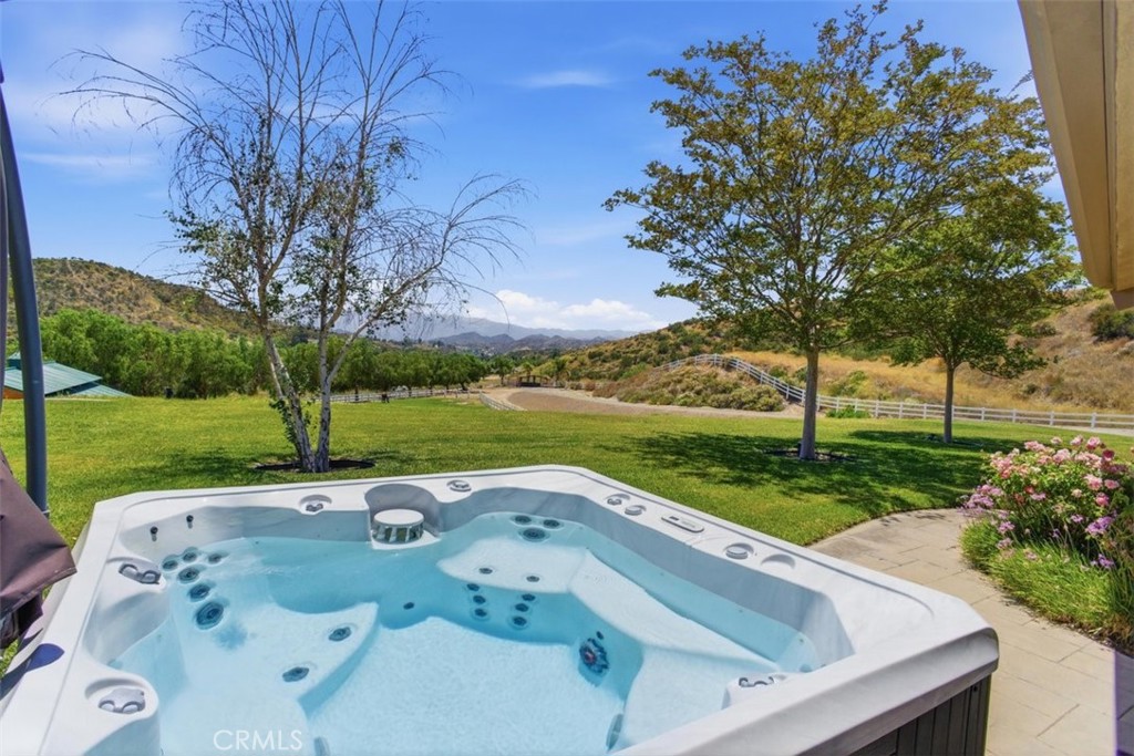 31233 Romero Canyon Road Castaic, CA 91384 - Photo 7 of 38 a view of swimming pool with a yard