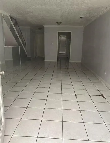 a view of a livingroom & window