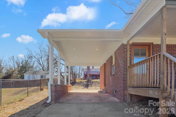 a view of a porch with furniture