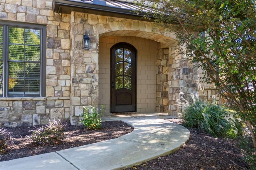 15 Cottage Lane, Unit 102 Toccoa, GA 30577 - Photo 14 of 40 a front view of a house with garden