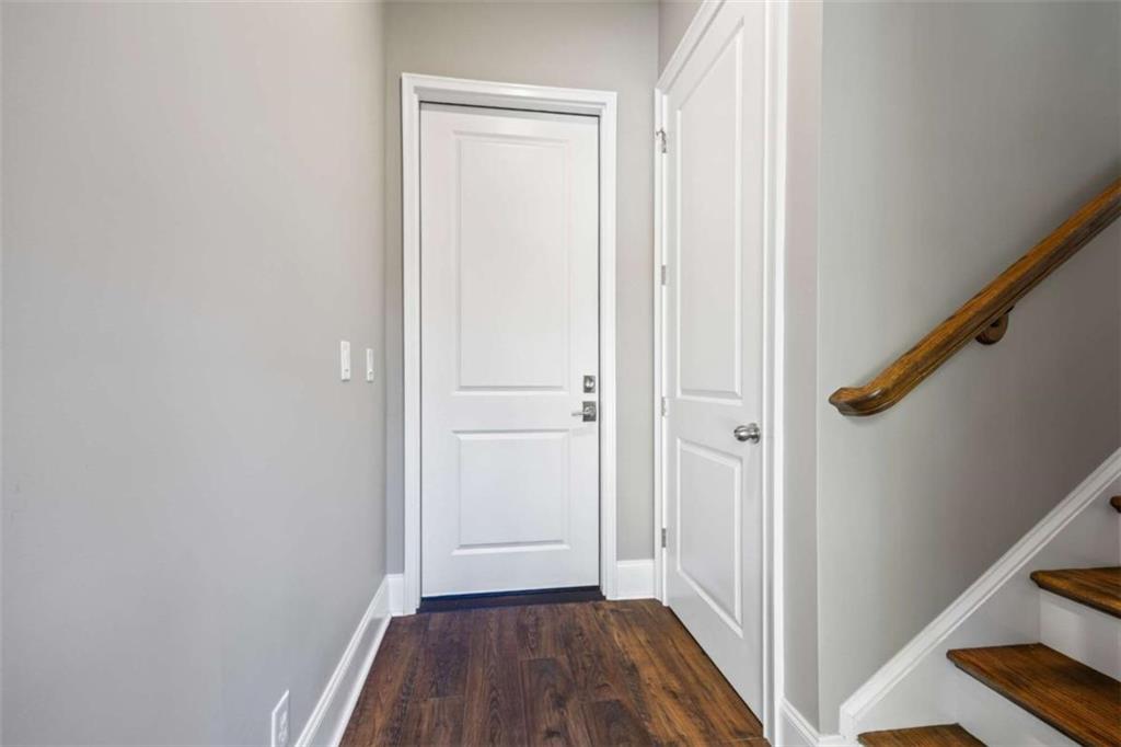 15 Cottage Lane, Unit 102 Toccoa, GA 30577 - Photo 16 of 40 a view of a hallway with wooden floor and staircase
