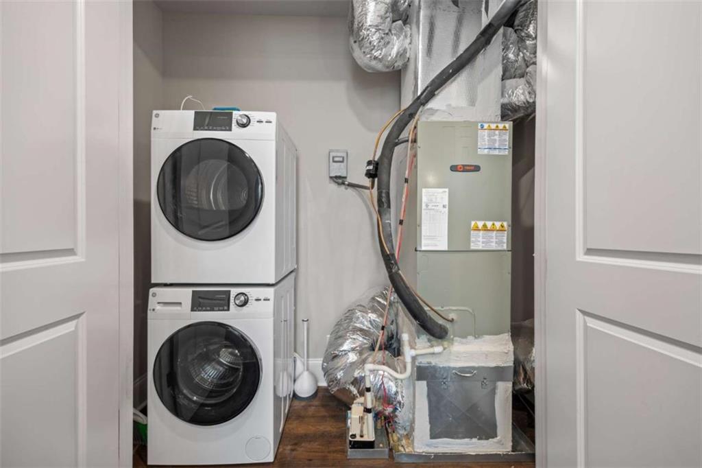 15 Cottage Lane, Unit 102 Toccoa, GA 30577 - Photo 24 of 40 a view of a storage and utility room with washer and dryer