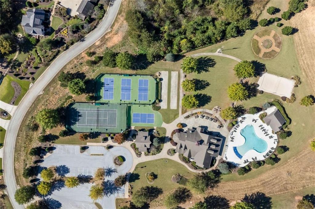 15 Cottage Lane, Unit 102 Toccoa, GA 30577 - Photo 6 of 40 an aerial view of a house with a yard and parking