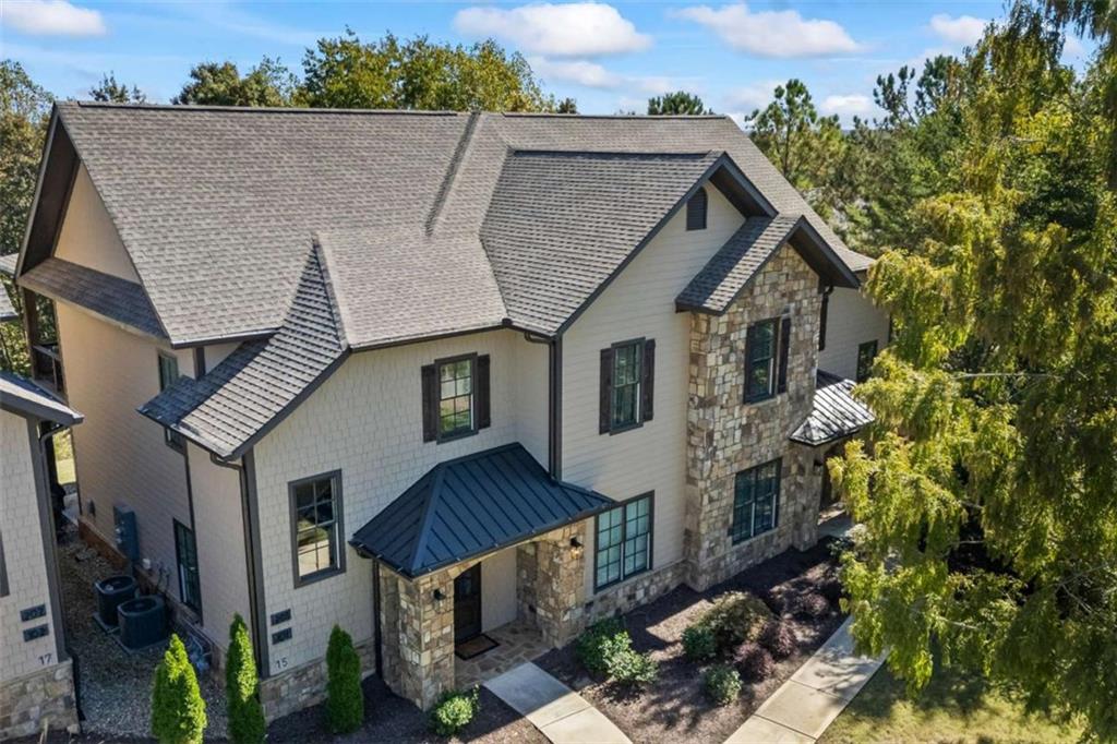 15 Cottage Lane, Unit 102 Toccoa, GA 30577 - Photo 9 of 40 a aerial view of a house with balcony and trees