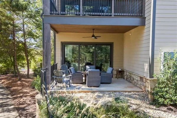 a view of a balcony with a floor to ceiling window