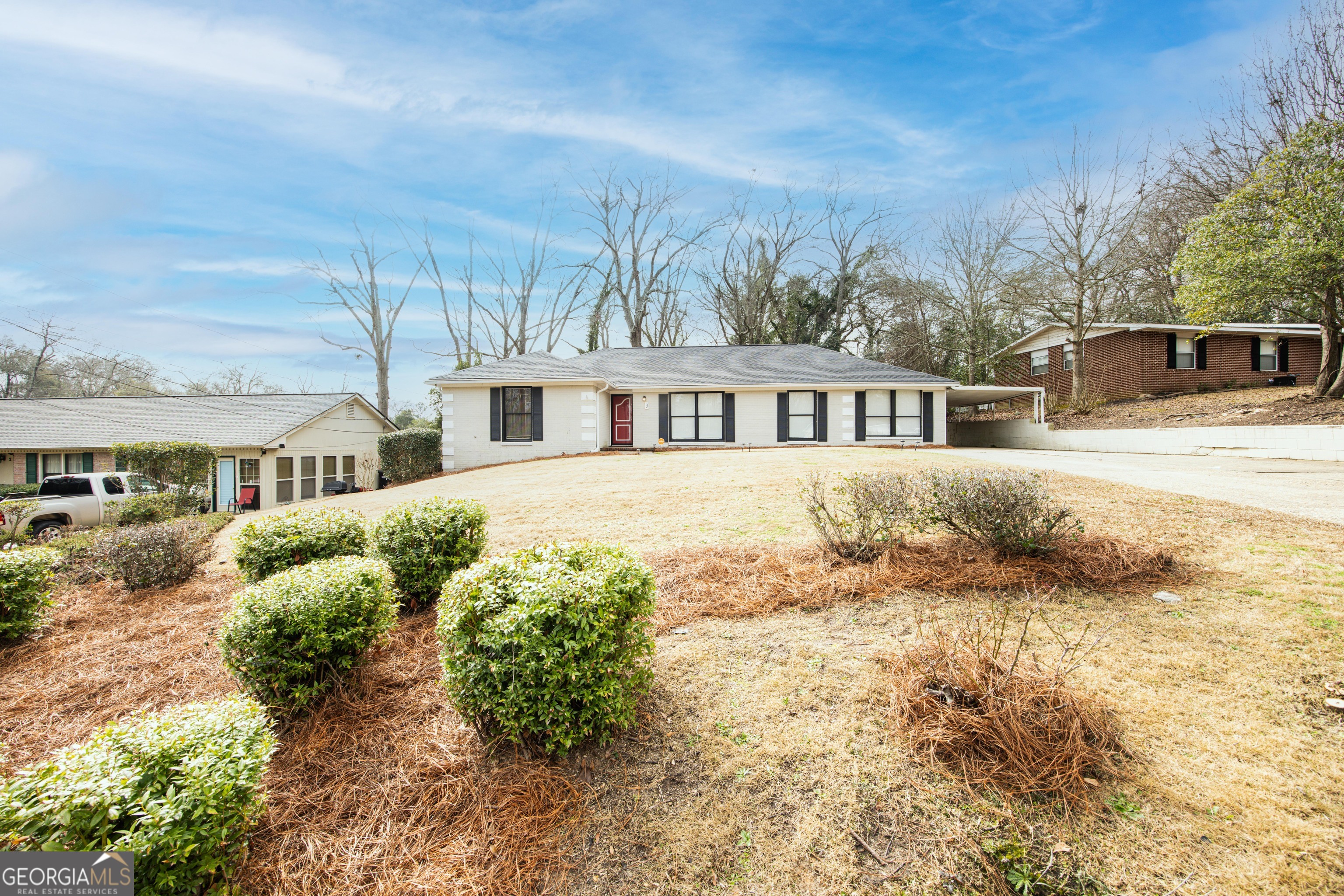 a view of multiple house with a yard