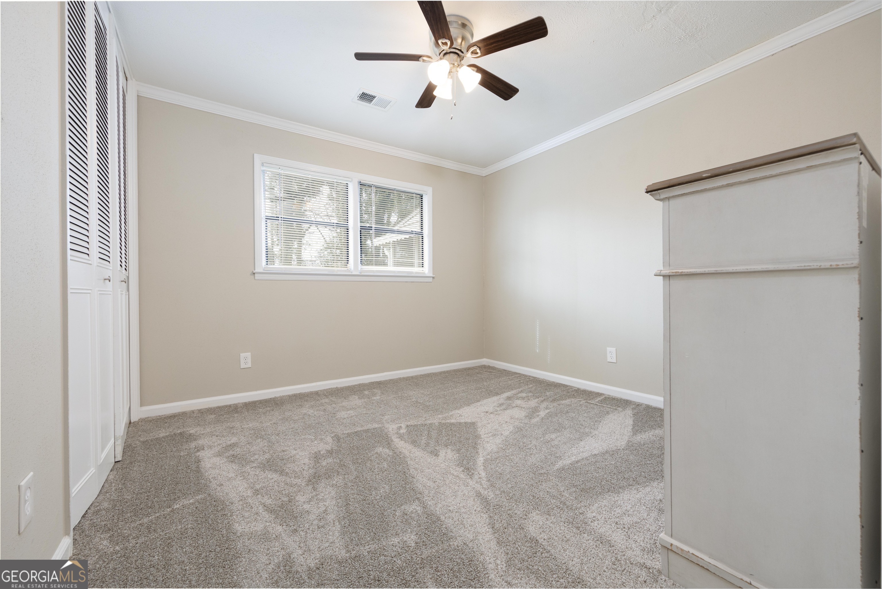 3 Primrose Court Columbus, GA 31907 - Photo 13 of 25 a view of an empty room with a window