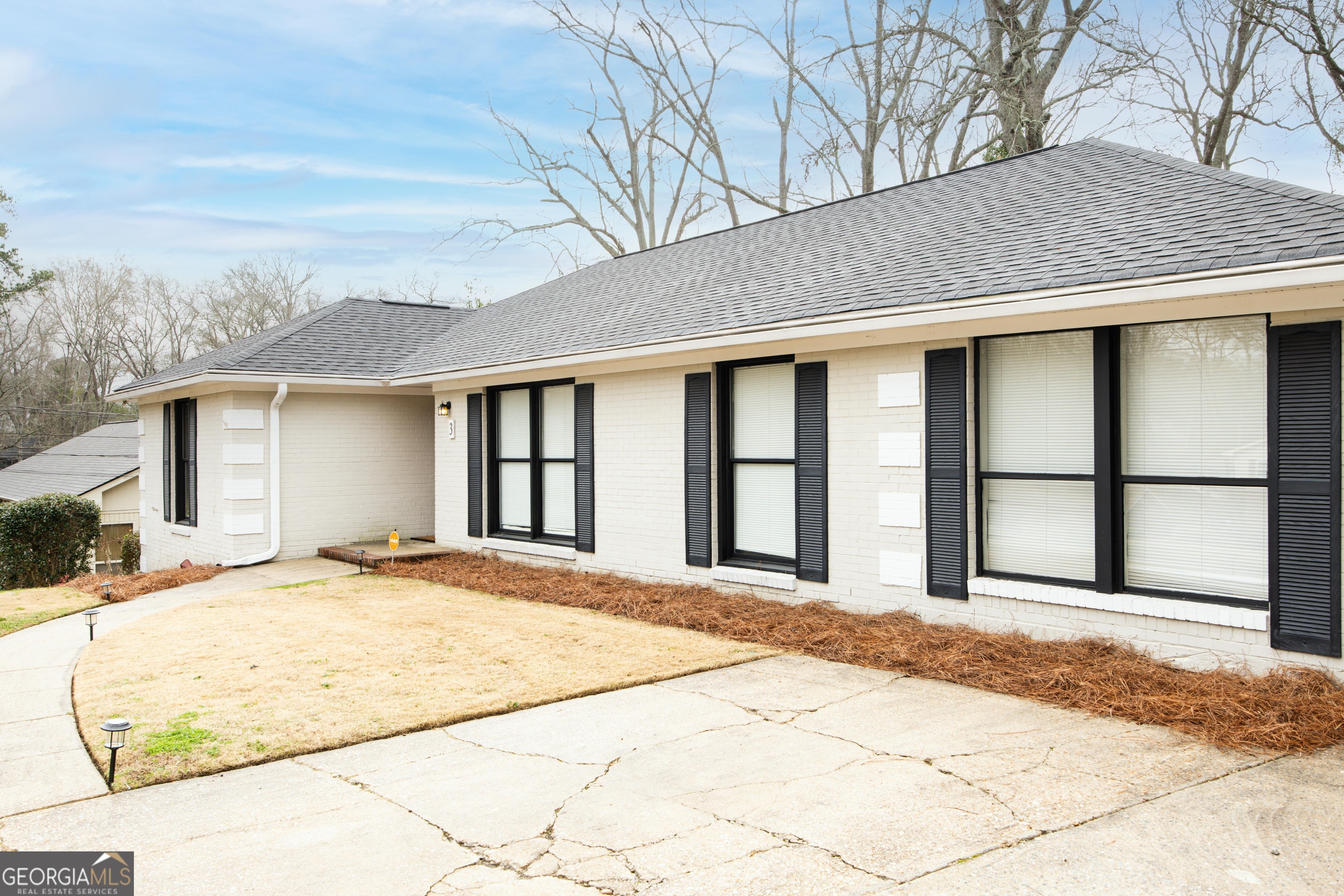 3 Primrose Court Columbus, GA 31907 - Photo 5 of 25 a view of a white house with a large windows
