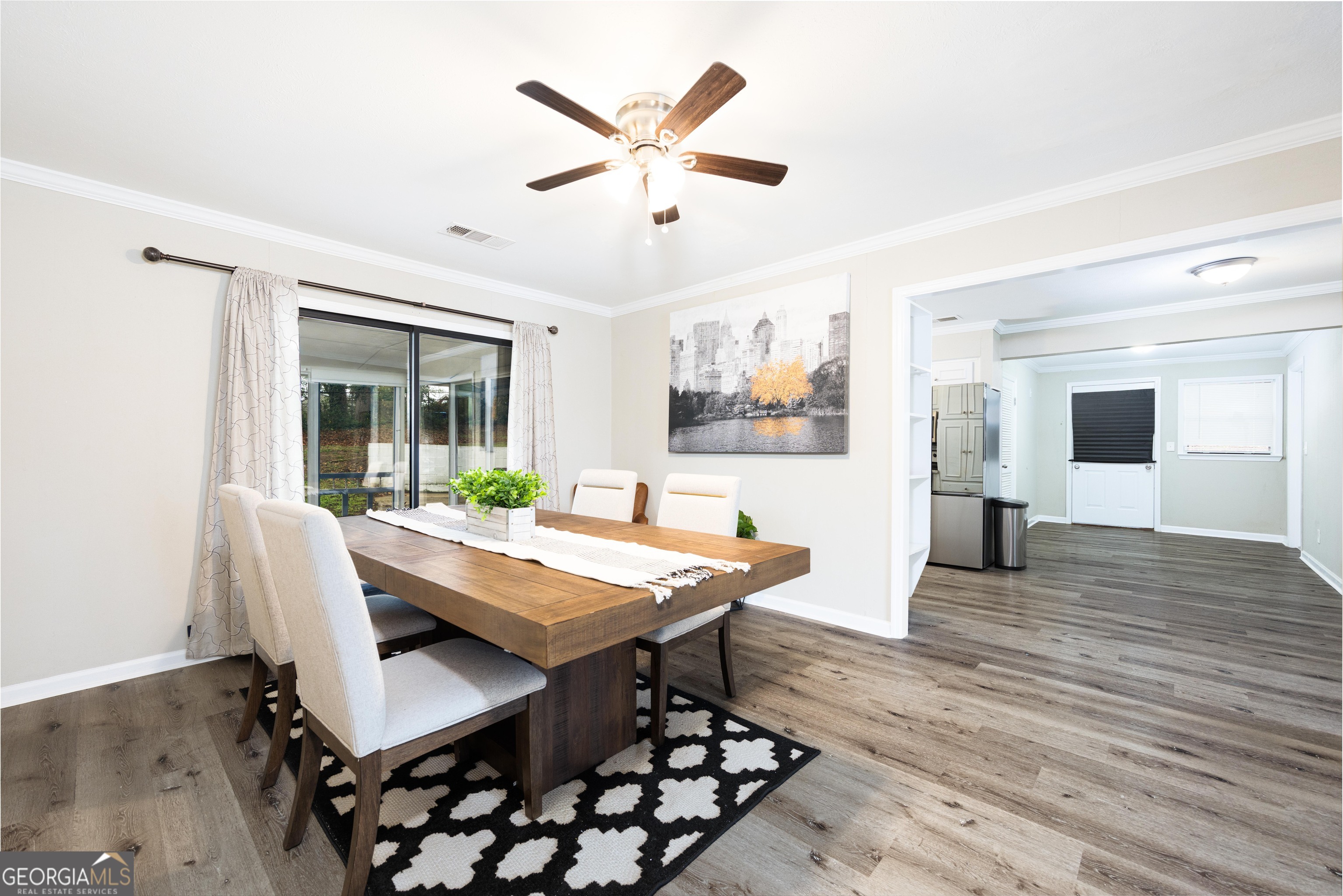 3 Primrose Court Columbus, GA 31907 - Photo 8 of 25 a view of a dining room with furniture and wooden floor