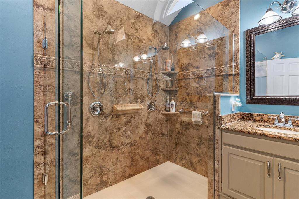 450 Northeast 55th Street Ocala, FL 34479 - Photo 28 of 68 a bathroom with a sink and shower