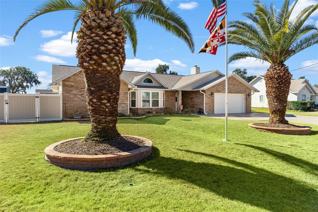 450 Northeast 55th Street Ocala, FL 34479 - Photo 4 of 68 a view of a house with a swimming pool
