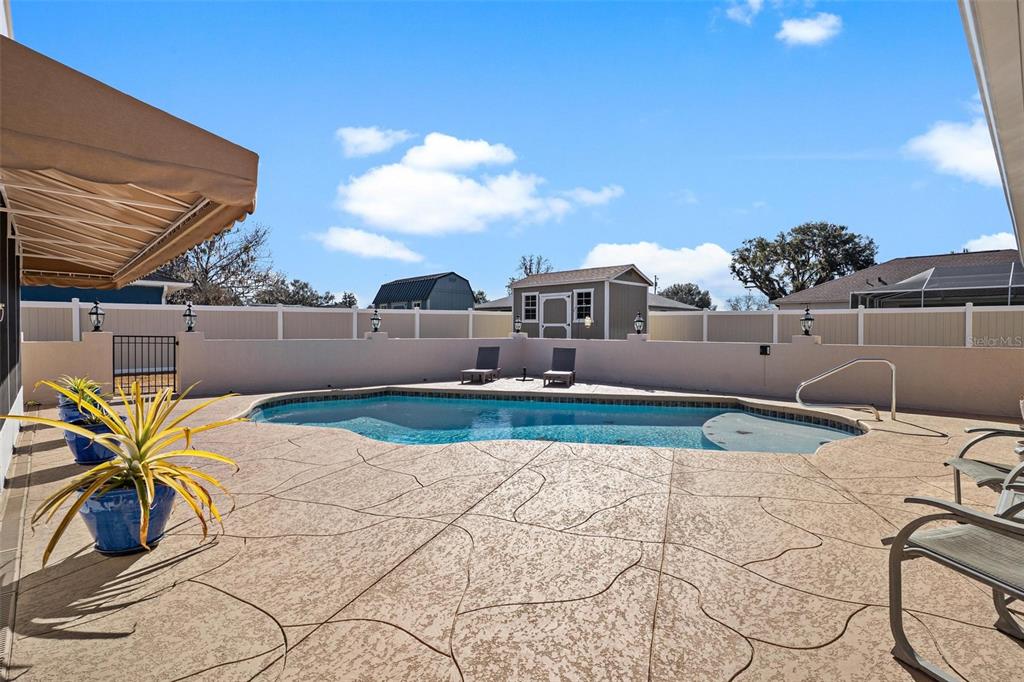 450 Northeast 55th Street Ocala, FL 34479 - Photo 41 of 68 a view of backyard with seating area