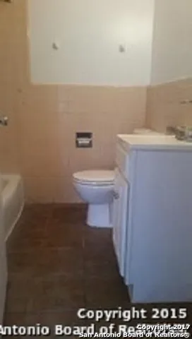 a bathroom with a sink and a toilet