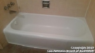 312 Babcock Road San Antonio, TX 78201 - Photo 6 of 10 a bathroom with a bathtub
