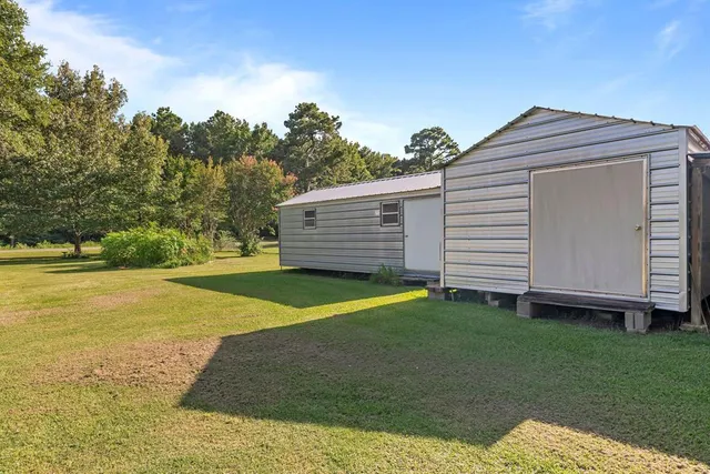 a view of a backyard with a garden