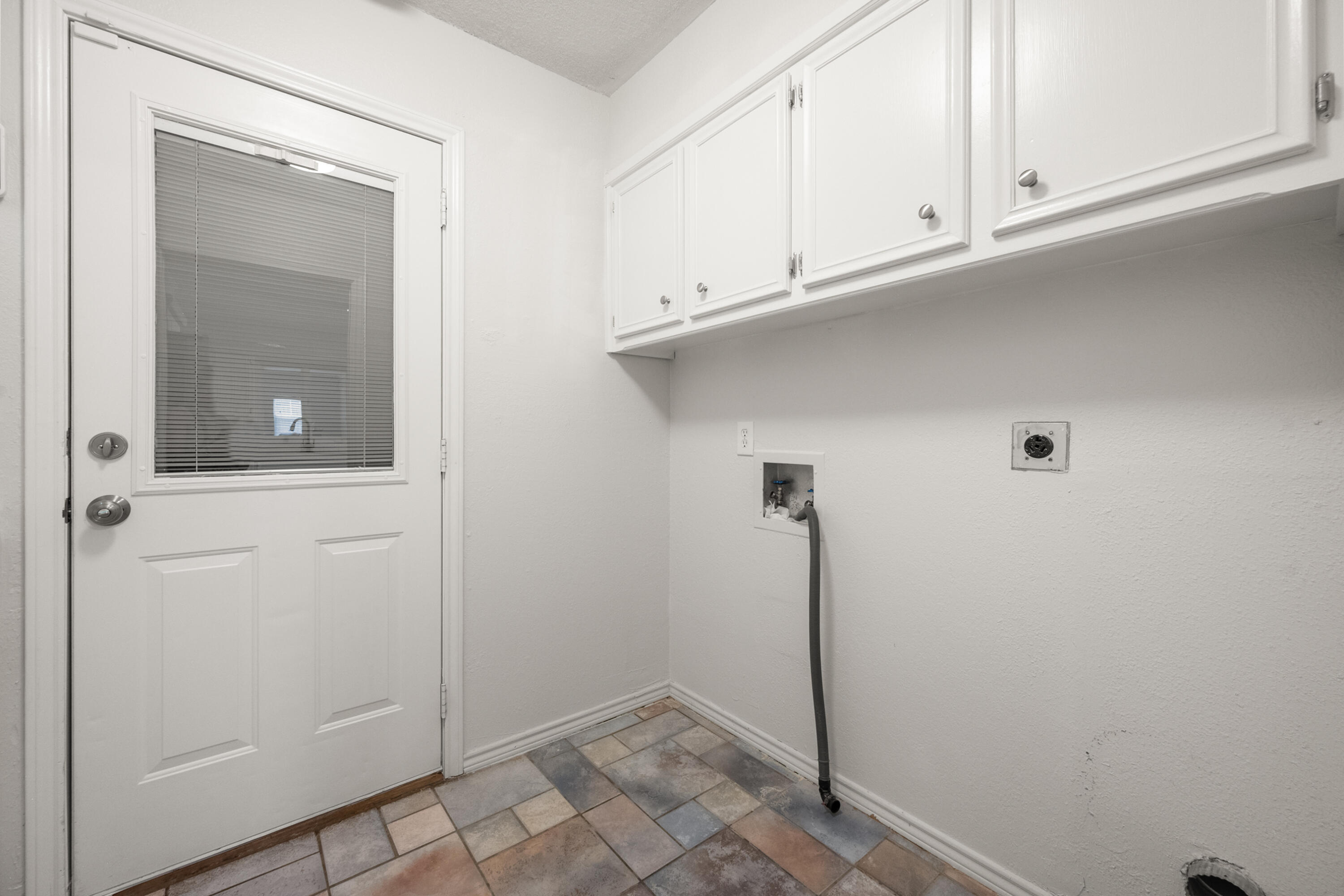 4523 79th Street Lubbock, TX 79424 - Photo 16 of 33 a view of an empty room with closet
