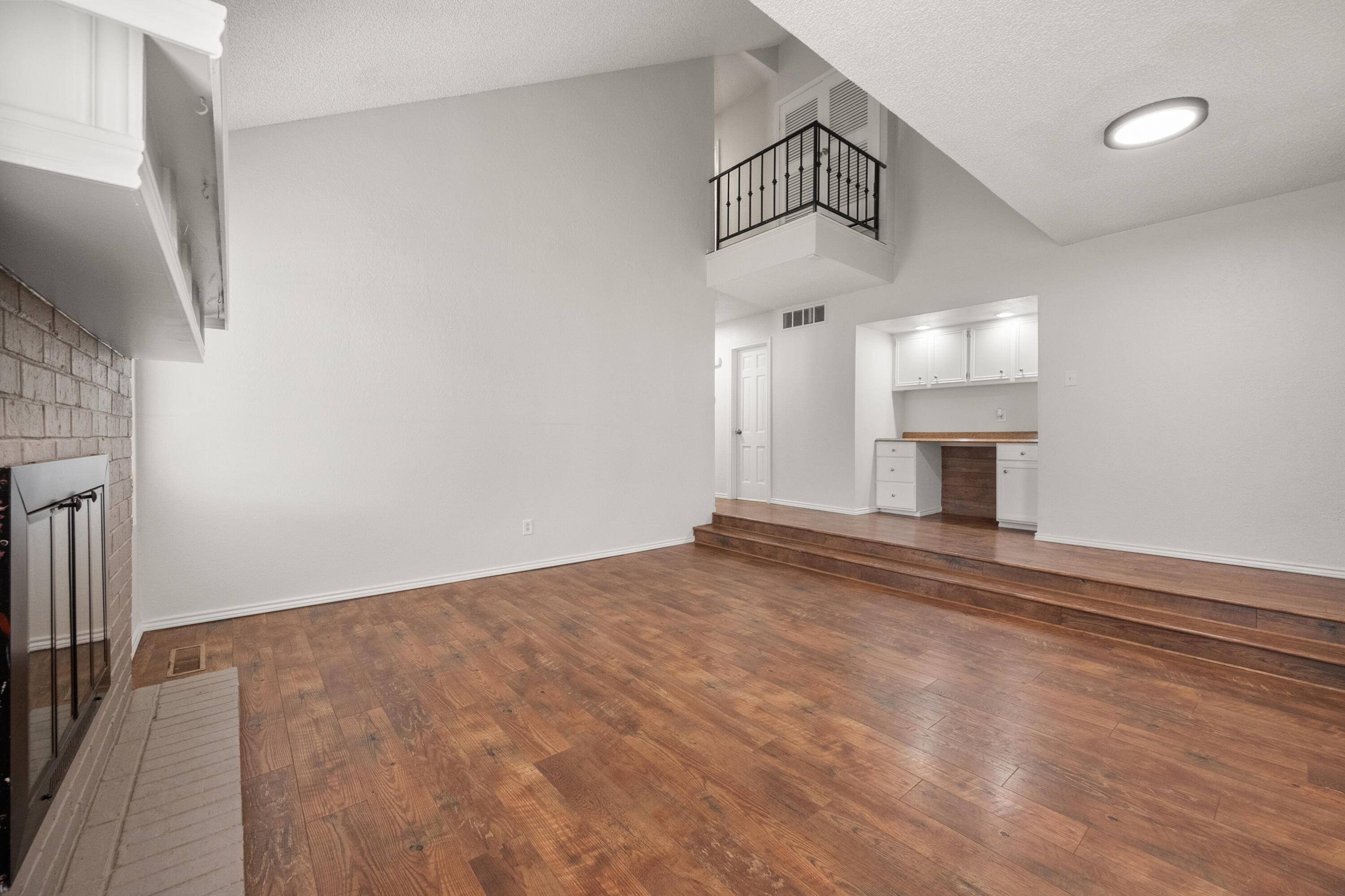 4523 79th Street Lubbock, TX 79424 - Photo 5 of 33 a view of a kitchen with a sink and a window