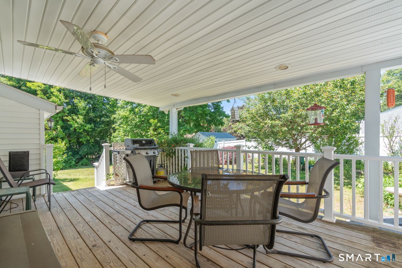 9 Stanton Road North Haven, CT 06473 - Photo 24 of 35 a view of a chairs and table on the wooden deck