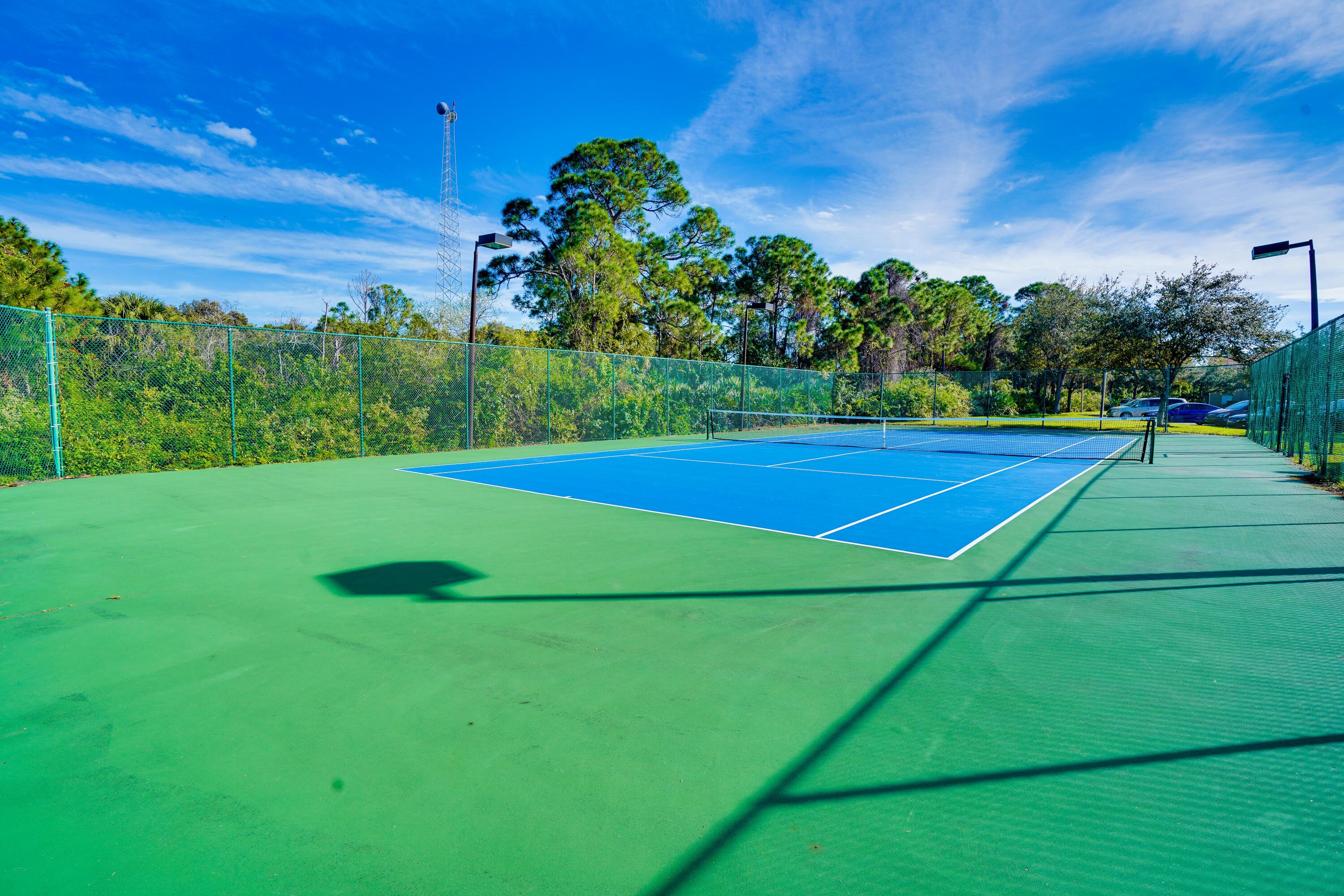3670 Northwest Adriatic Lane Jensen Beach, FL 34957 - Photo 24 of 26 a view of a tennis court