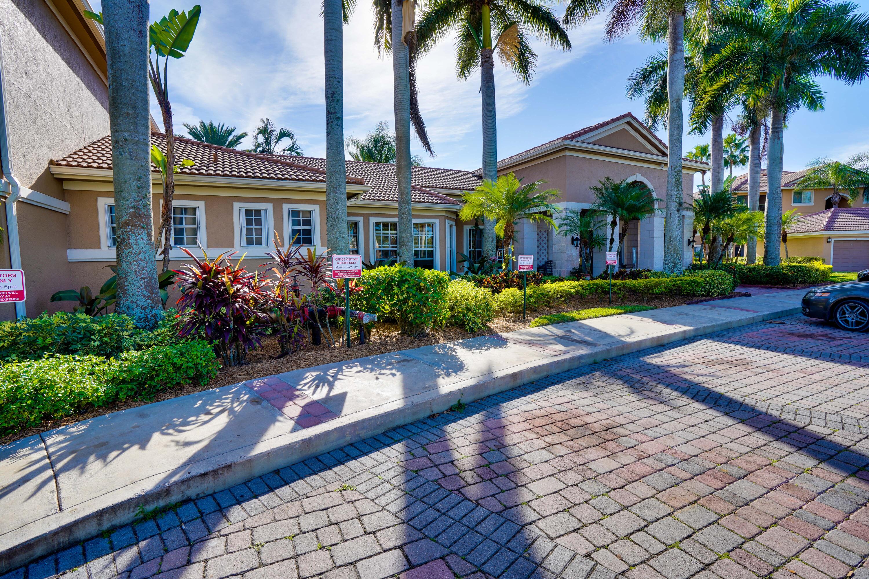 3670 Northwest Adriatic Lane Jensen Beach, FL 34957 - Photo 26 of 26 a front view of house with yard and green space