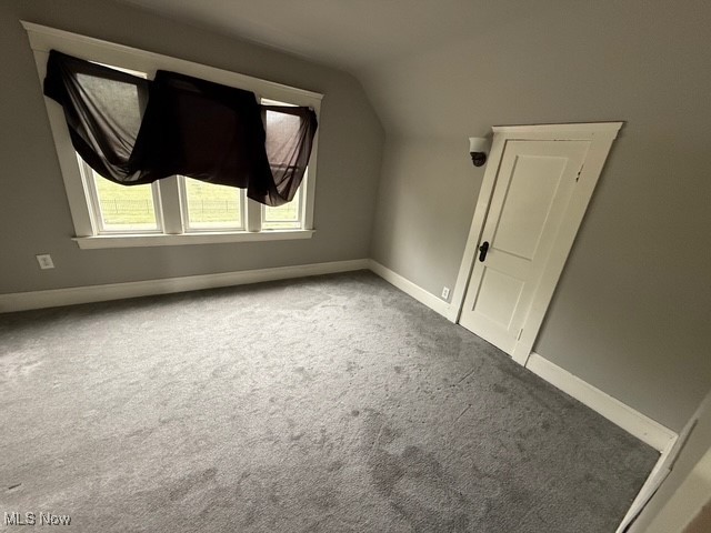 4372 Turney Road Cleveland, OH 44105 - Photo 2 of 16 Bonus room with carpet floors and vaulted ceiling