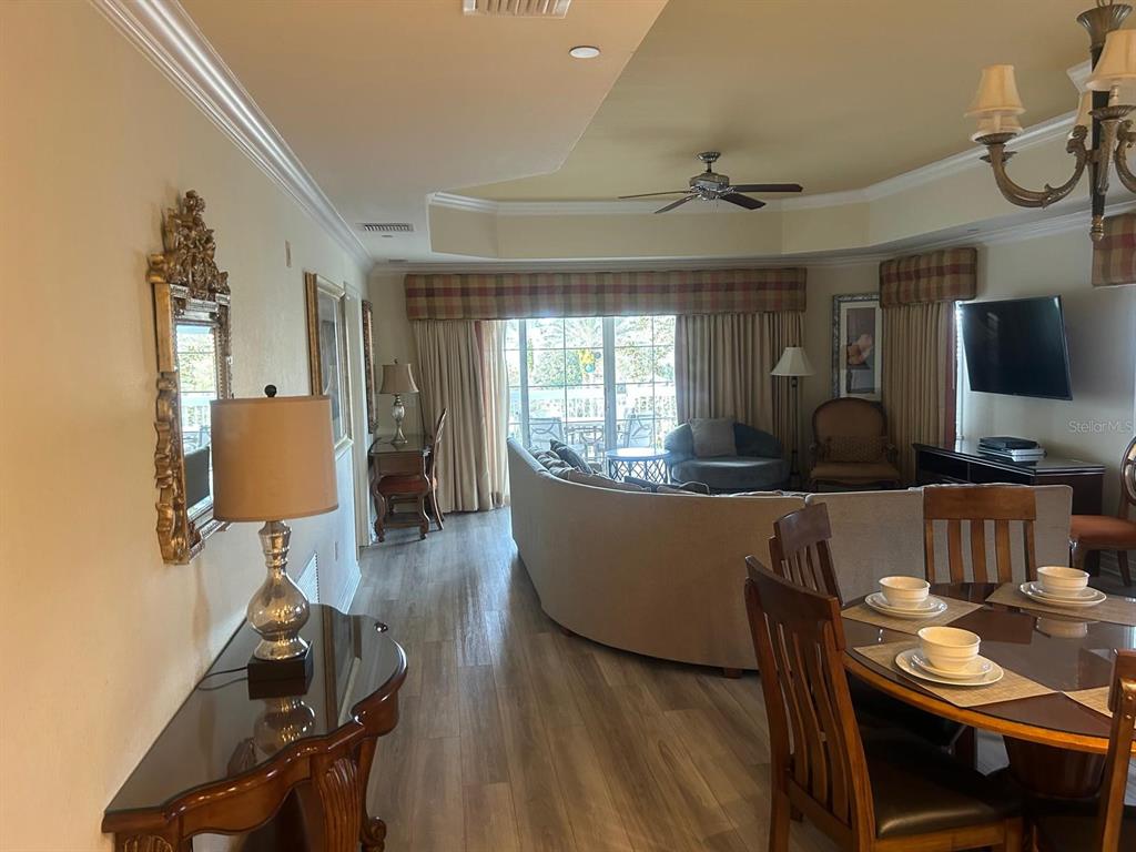 Undisclosed Address Reunion, FL 34747 - Photo 11 of 29 a living room with furniture and a flat screen tv