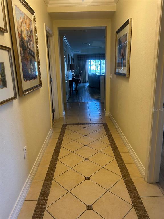 Undisclosed Address Reunion, FL 34747 - Photo 2 of 29 a view of a hallway with wooden floor