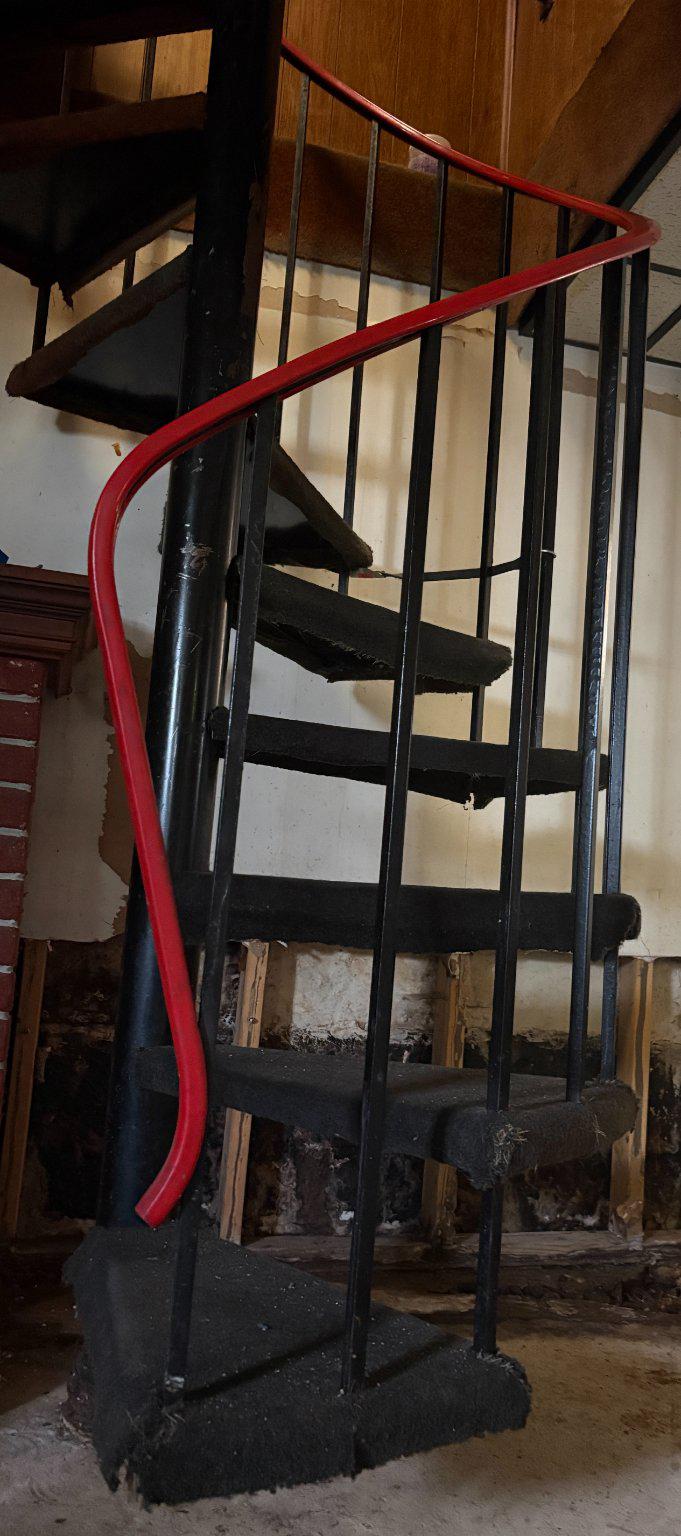 1621 Rosewick Avenue Rosedale, MD 21237 - Photo 16 of 37 Spiraling staircase- bold accents. Kitchen entry