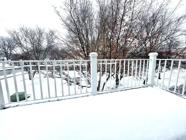 a view of a balcony with trees