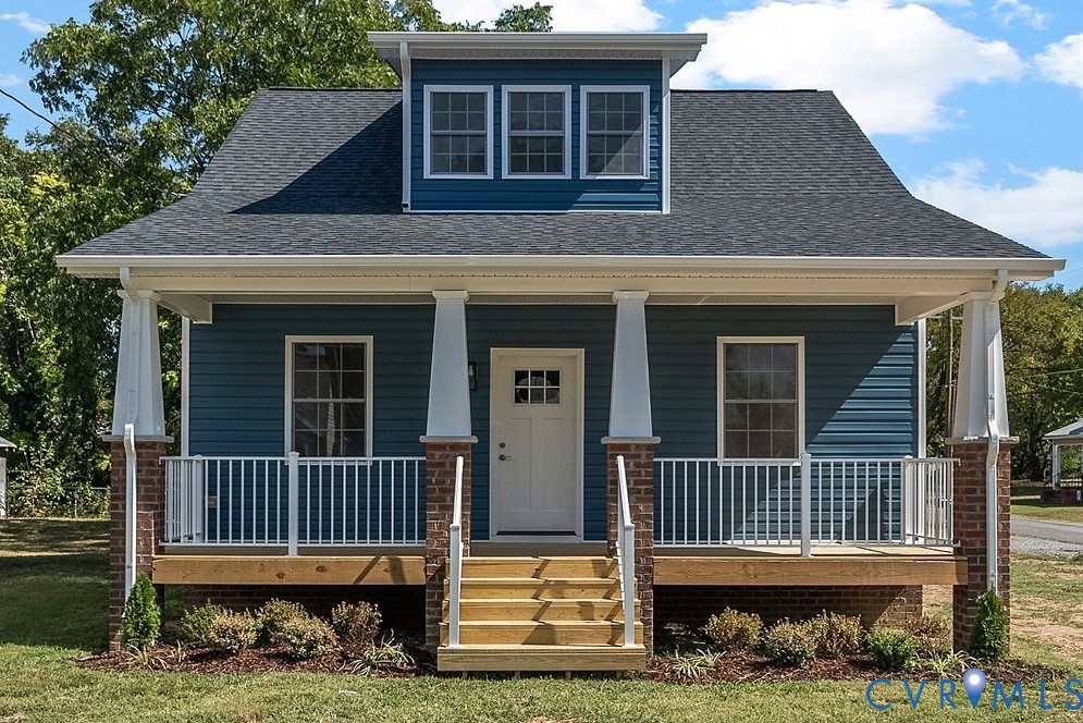 a front view of a house with a porch