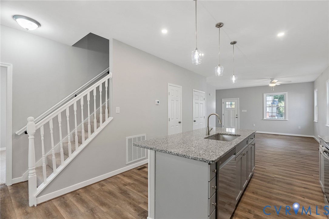 2768 Venter Road Aylett, VA 23009 - Photo 11 of 31 a view of kitchen and hall with wooden floor