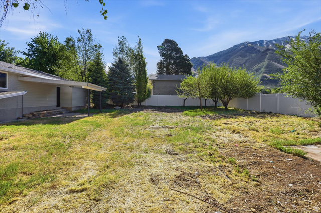 810 East Maple Street Mapleton, UT 84664 - Photo 33 of 49 Expansive backyard with a partial mountain backdrop