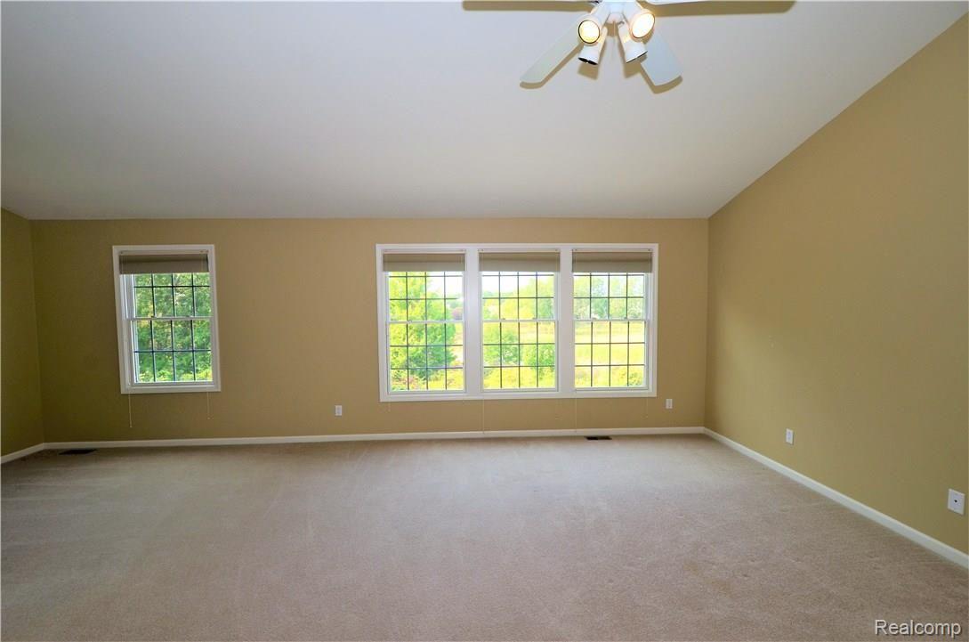 5304 Ashmonte Court Rochester, MI 48306 - Photo 16 of 47 Master bedroom with beautiful yard view