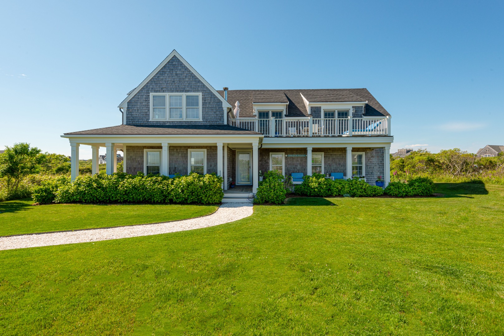 30 Wanoma Way Nantucket, MA 02554 - Photo 55 of 57 a front view of a house with garden
