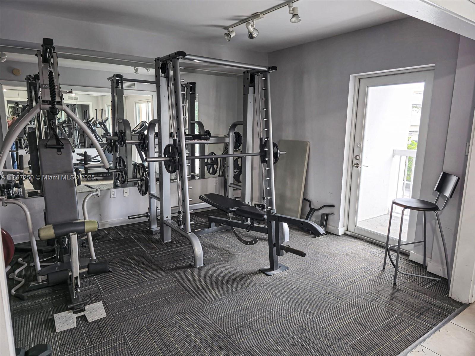 2740 Southwest 28th Terrace, Unit 603 Miami, FL 33133 - Photo 19 of 21 a view of a room with gym equipment