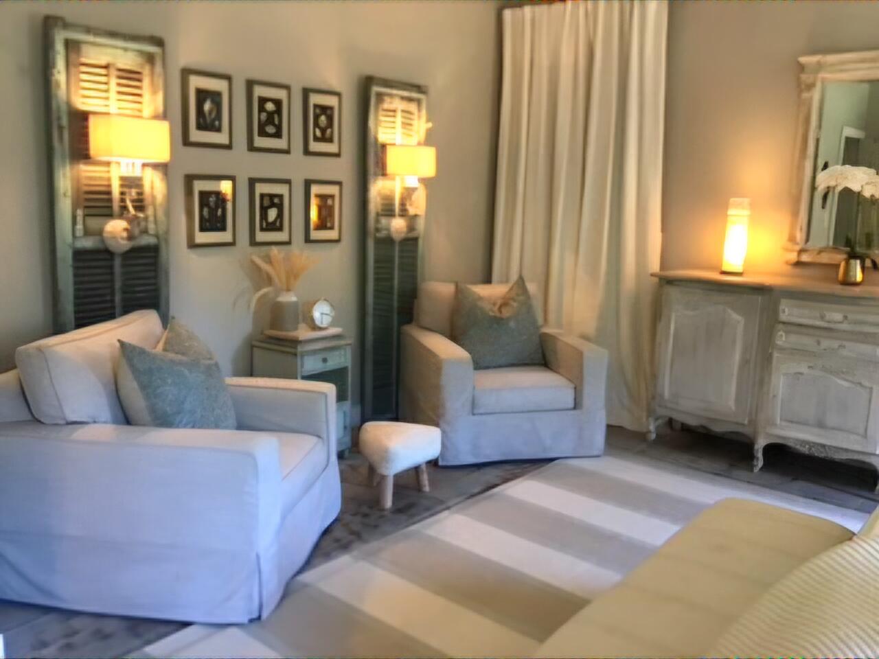 248 Blueberry Road Freeport, FL 32439 - Photo 14 of 37 a living room with furniture and a large window