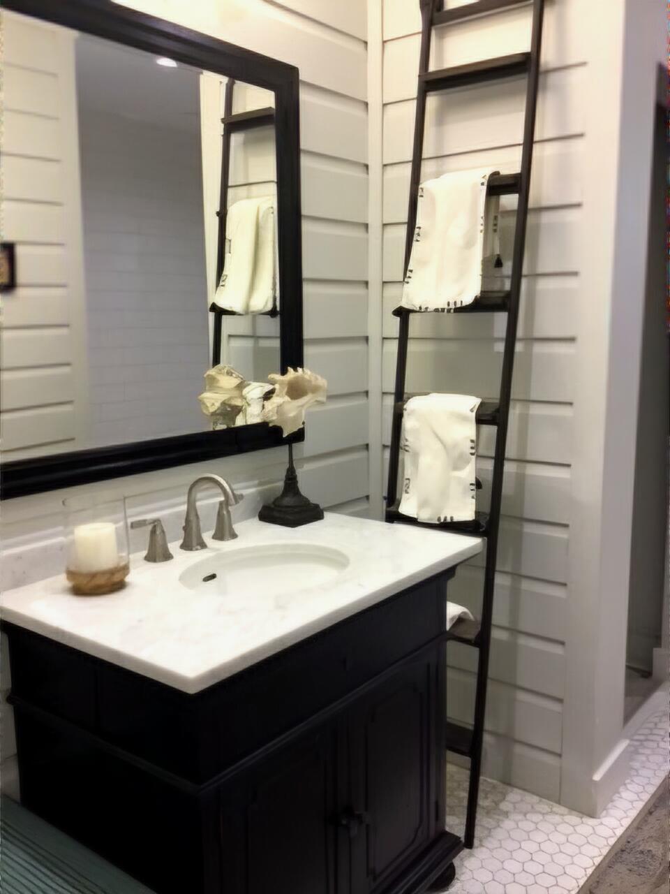 248 Blueberry Road Freeport, FL 32439 - Photo 15 of 37 a bathroom with a sink and a mirror