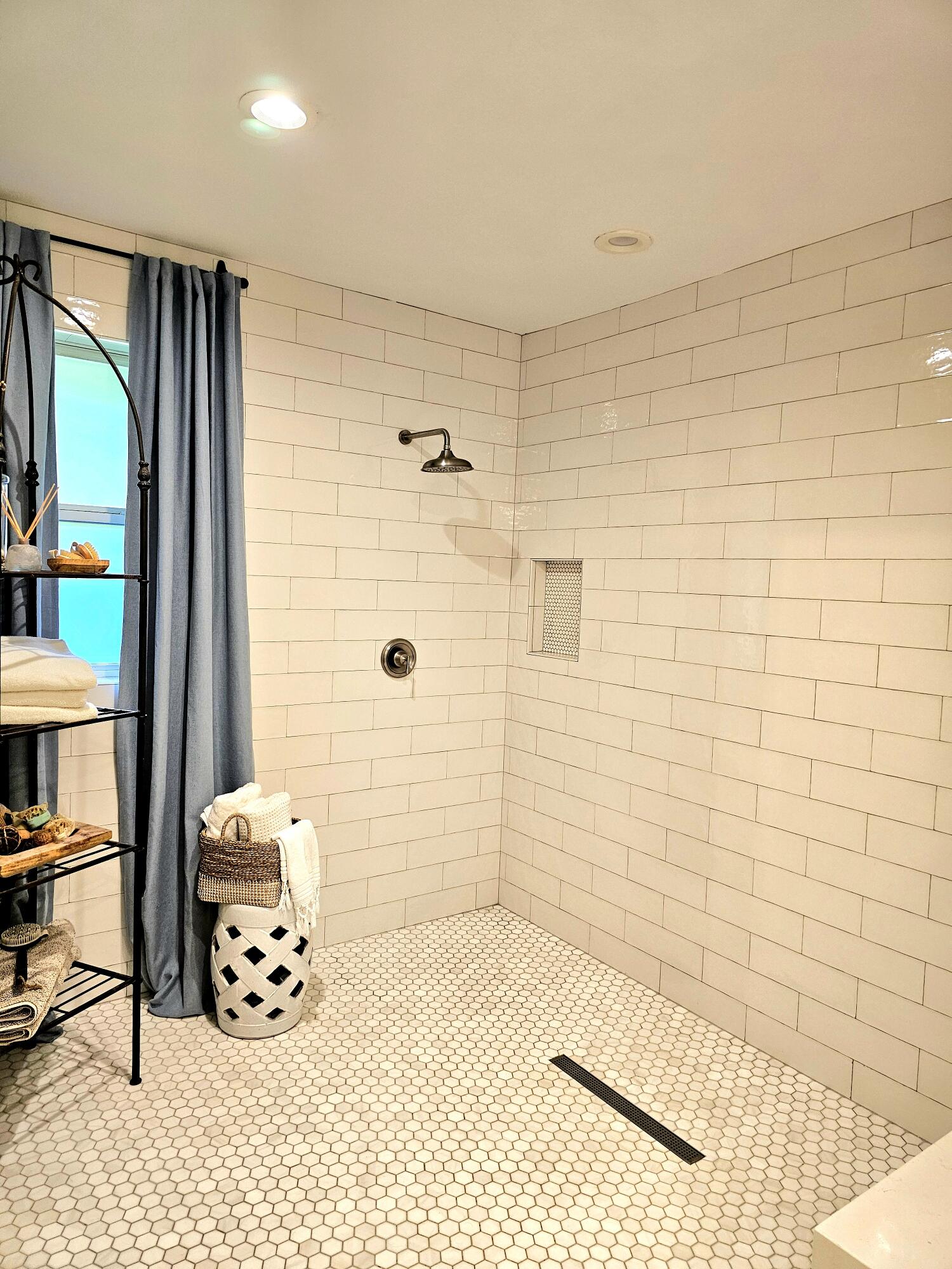 248 Blueberry Road Freeport, FL 32439 - Photo 17 of 37 a bathroom with a sink and a shower