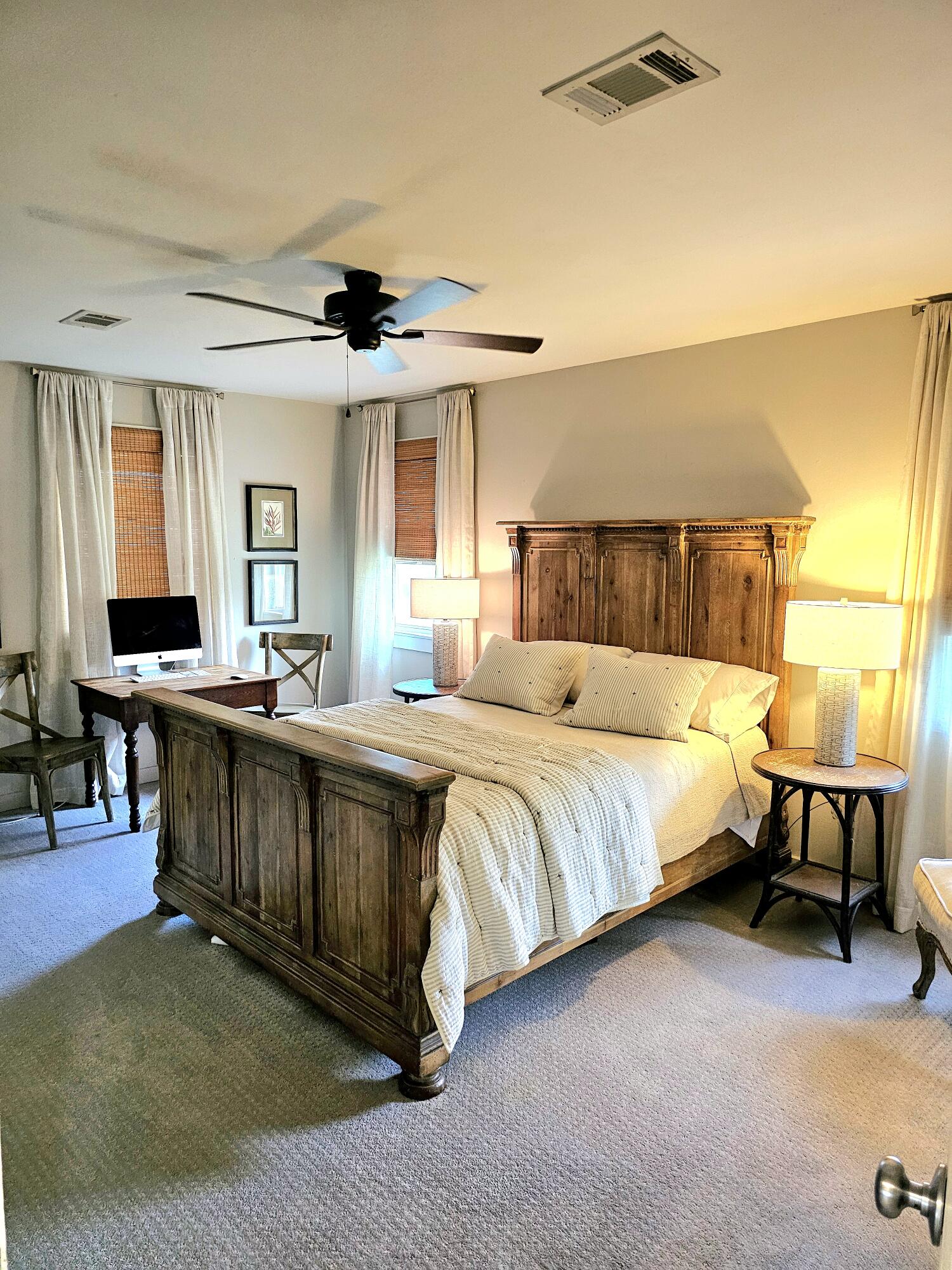 248 Blueberry Road Freeport, FL 32439 - Photo 25 of 37 a spacious bedroom with a bed and a table in it