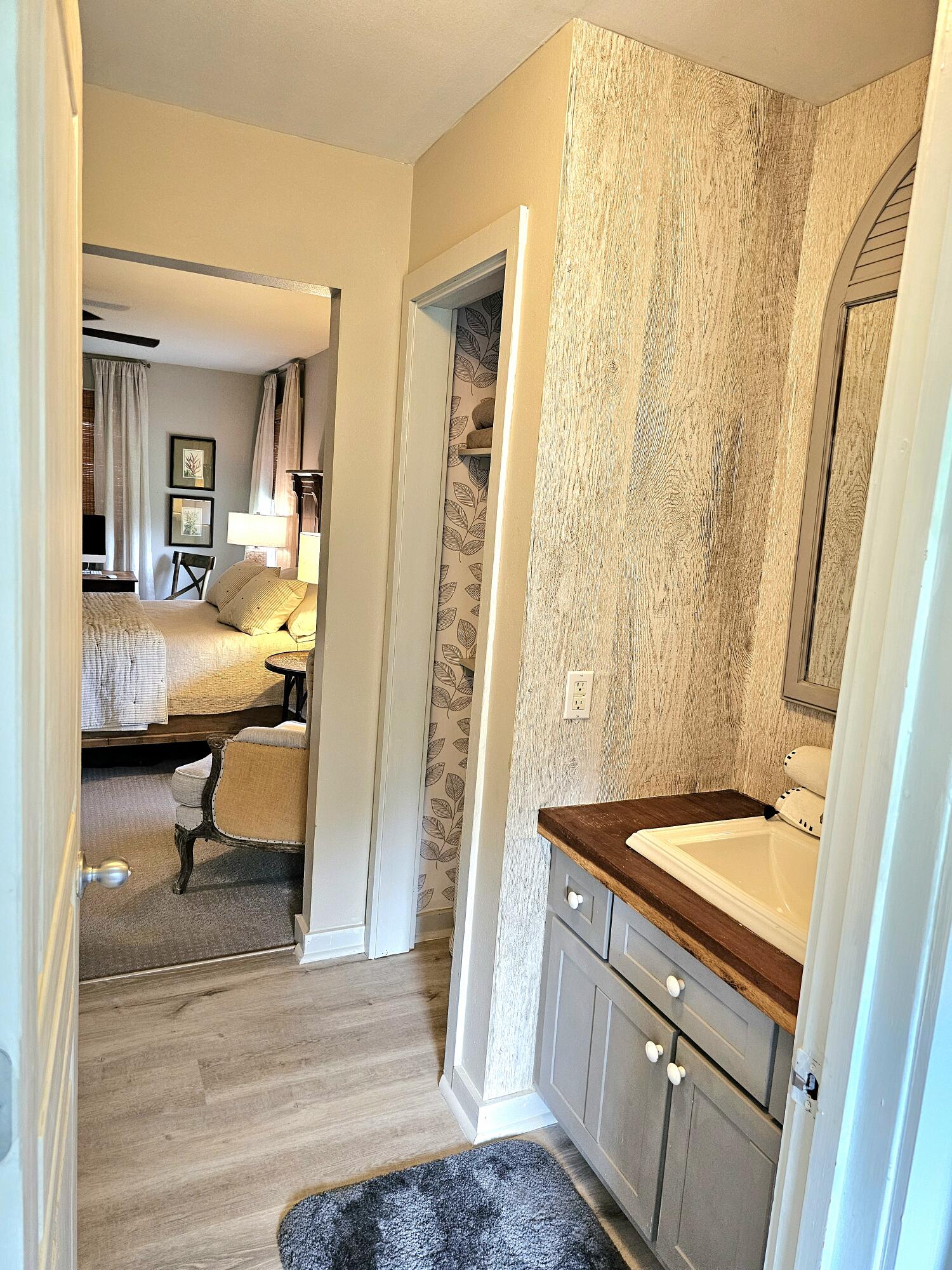 248 Blueberry Road Freeport, FL 32439 - Photo 30 of 37 a bathroom with a sink and a mirror