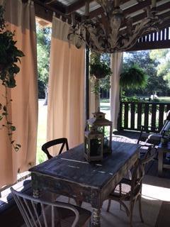 248 Blueberry Road Freeport, FL 32439 - Photo 6 of 37 a view of a dining room with furniture window and outside view