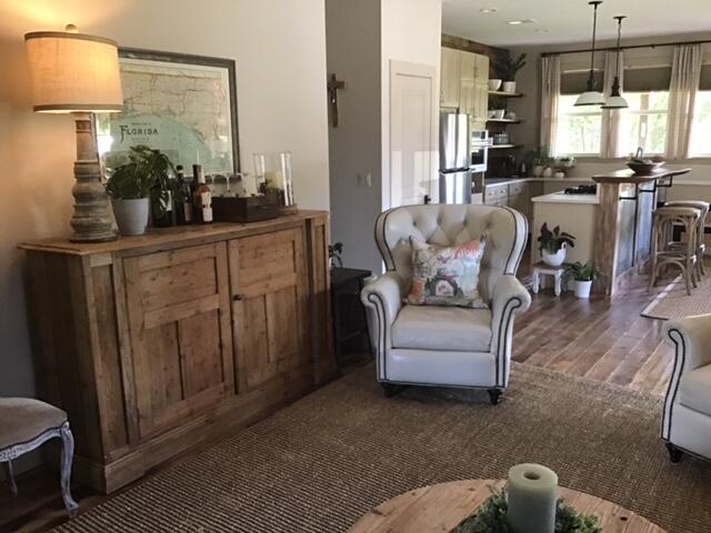 248 Blueberry Road Freeport, FL 32439 - Photo 10 of 37 a living room with furniture and a lamp