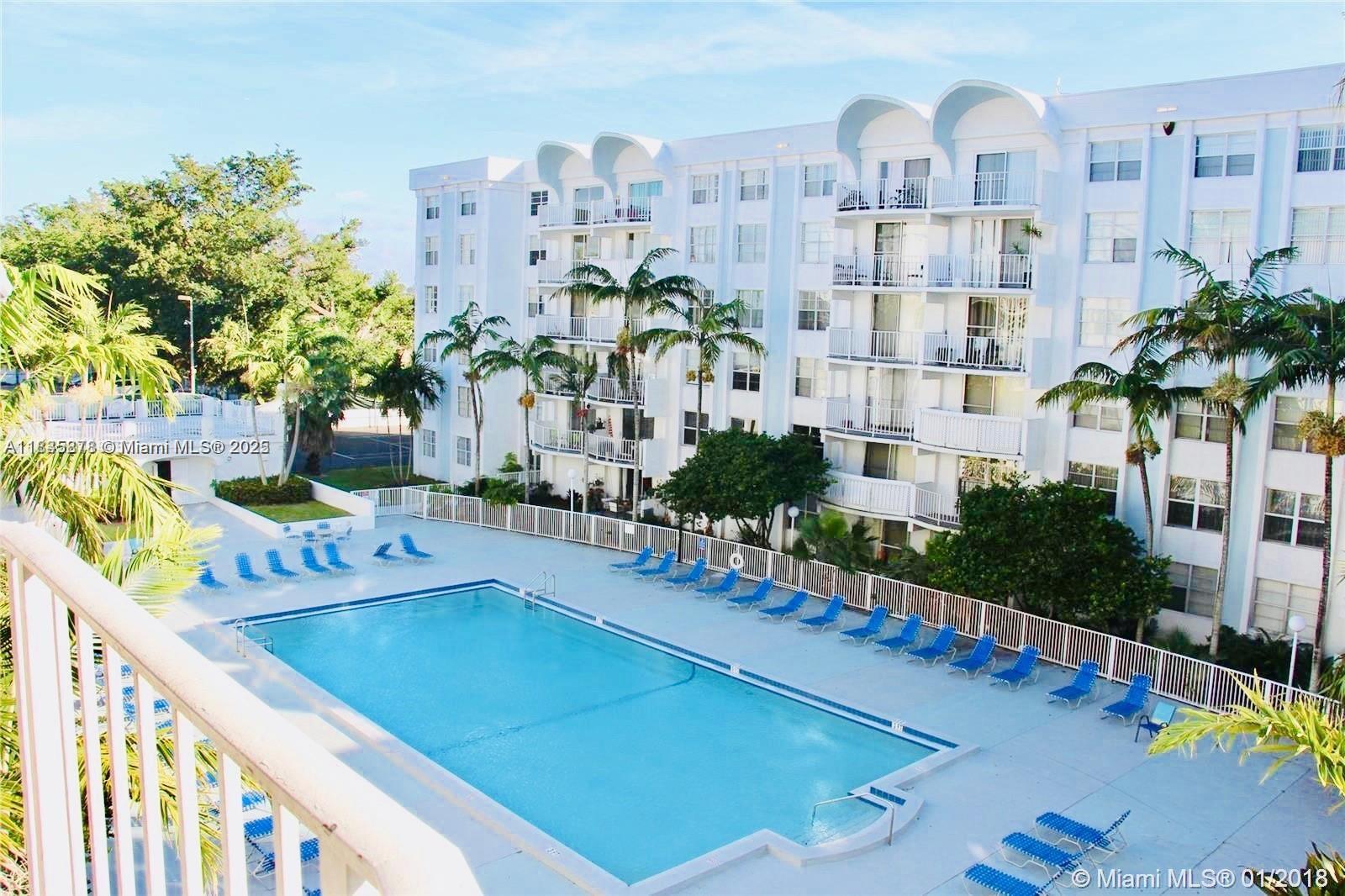 a view of a city with tall buildings