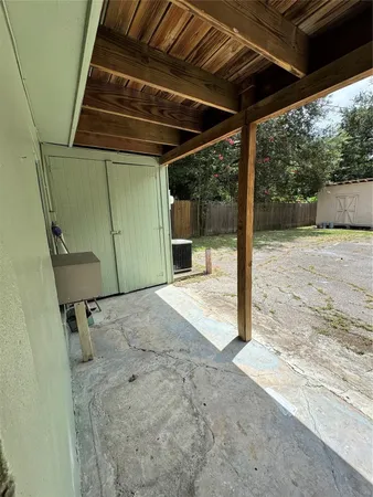 a view of a backyard space