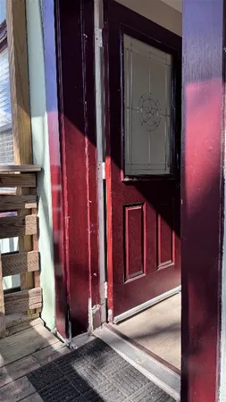 a view of a door with a red door